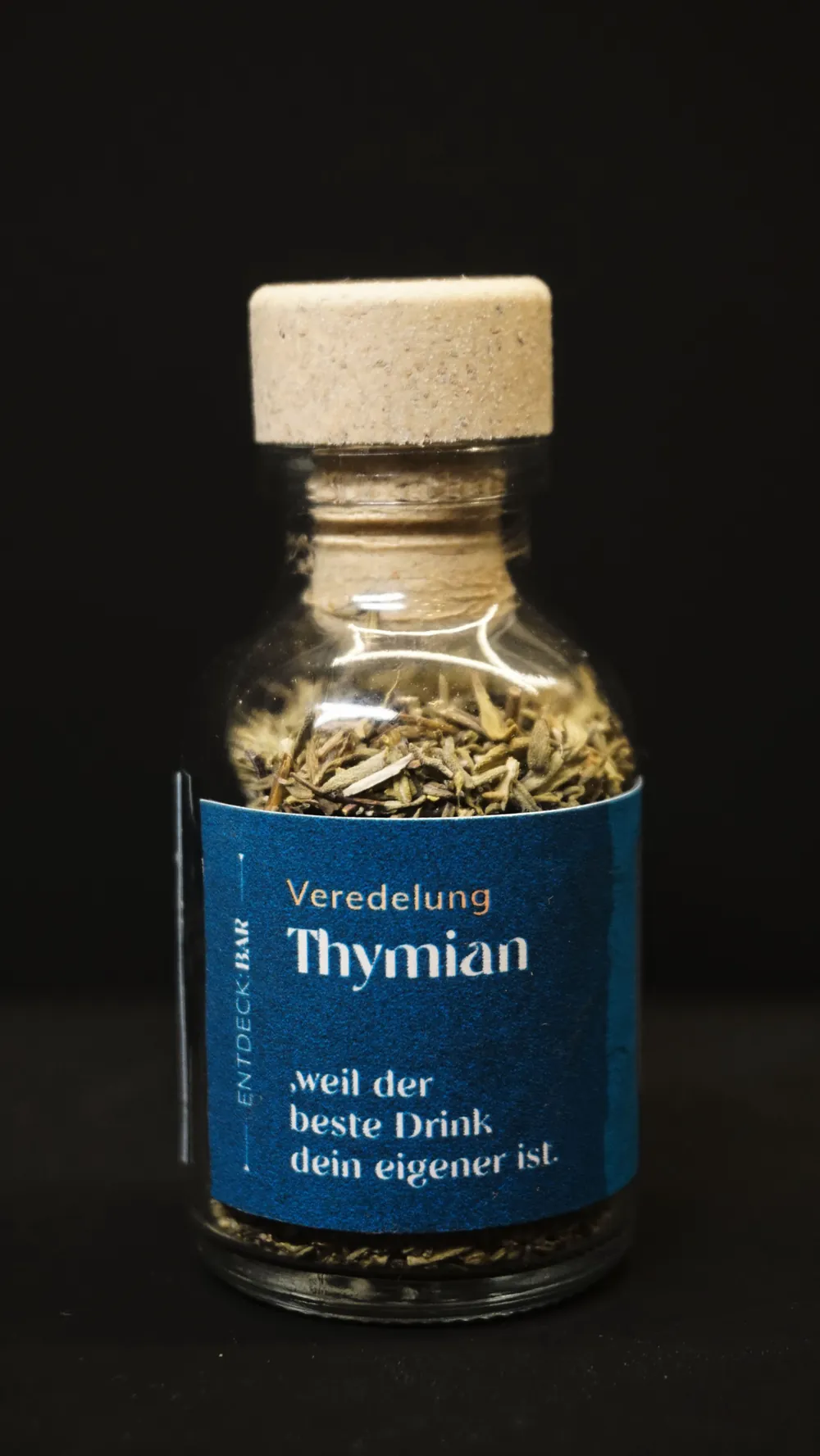 Bottle with thyme and label