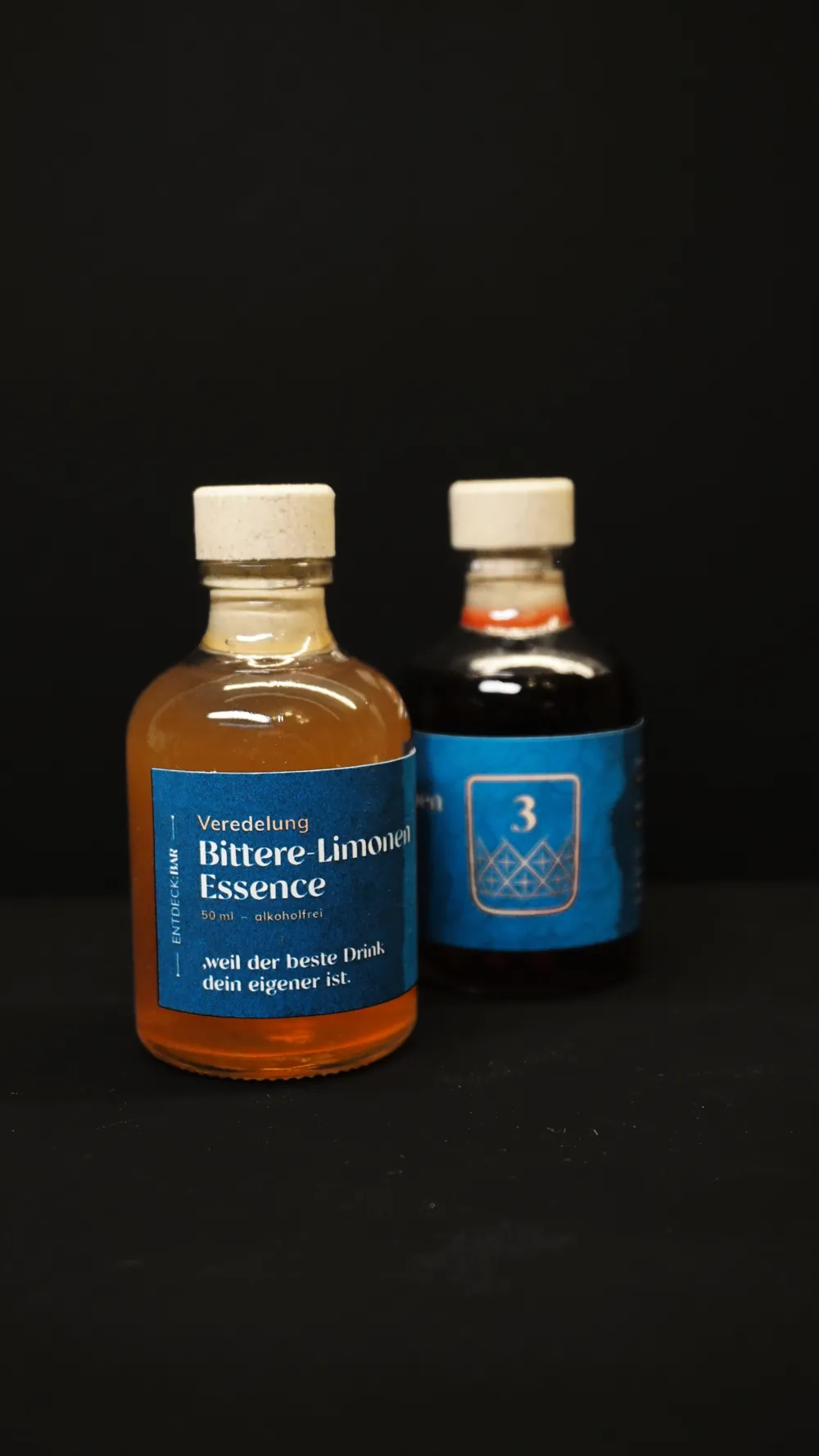 Two bottles with the number 3
