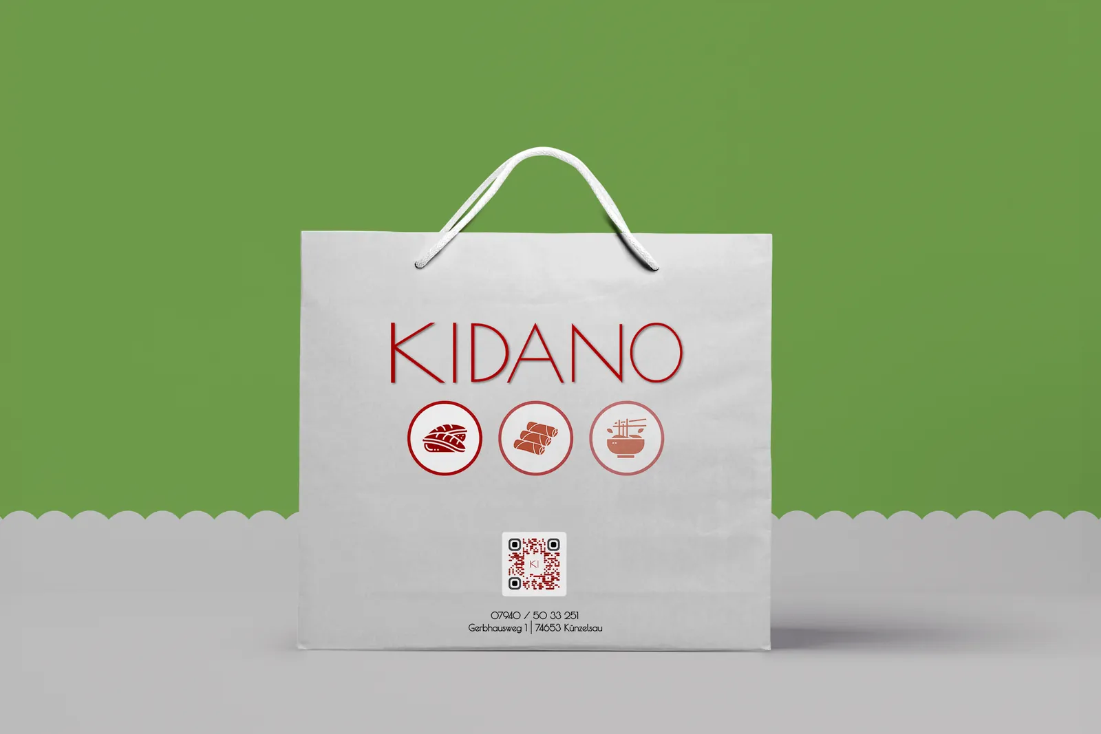 White paper bag with logo and three icons